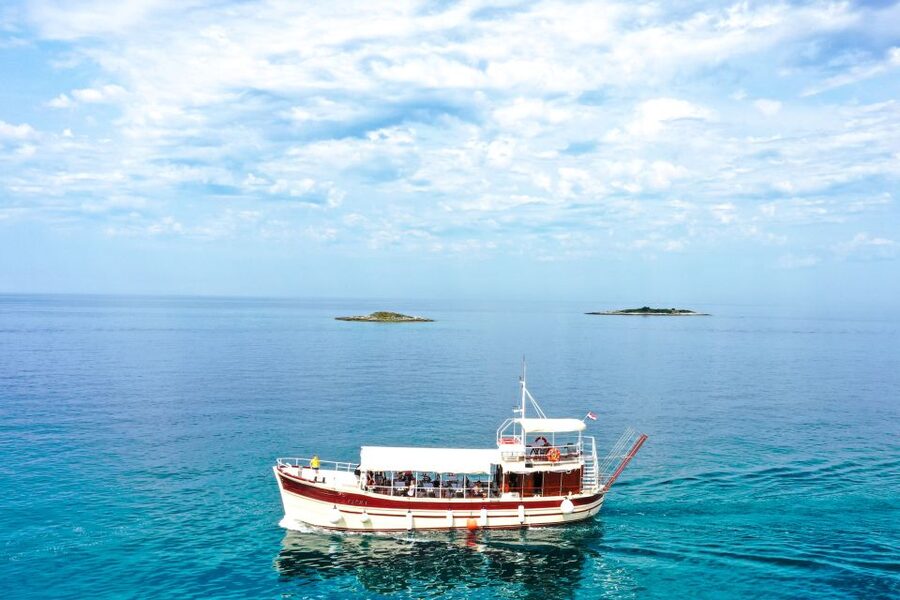 Poreč: Panoramic Morning Cruise Among 20 Islands with Drinks - Starting at Poreč Port, and Finding the Right Boat