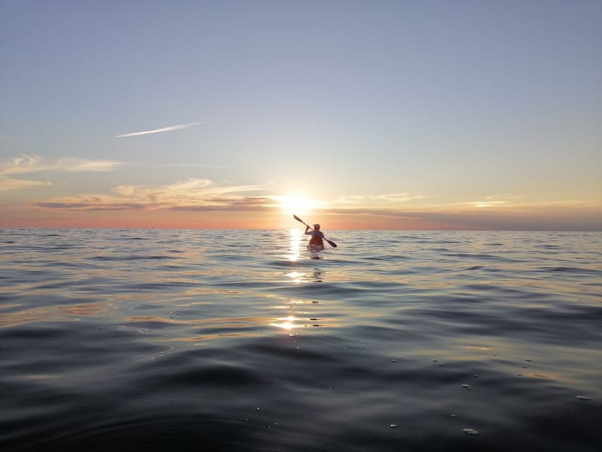 Poreč: Sea Kayaking Sunset Tour - Weather reality check: clouds, calm seas, and the dolphin maybe