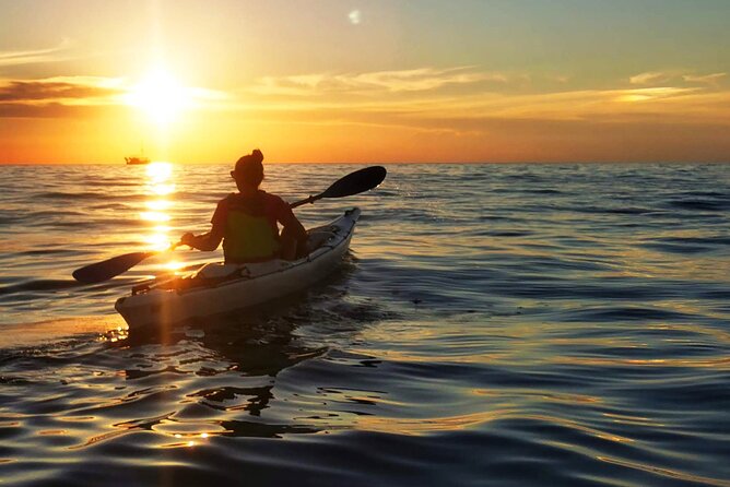 Poreč sunset sea kayaking tour - That pause moment: snacks on the water and the easy break