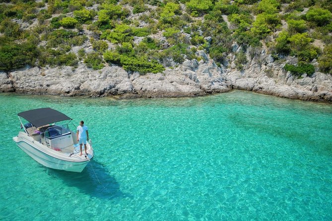 Private Full-Day Croatian Islands Boat Tour from Trogir - Stop 3: Maslinica Beach, short snorkel and swim time before lunch