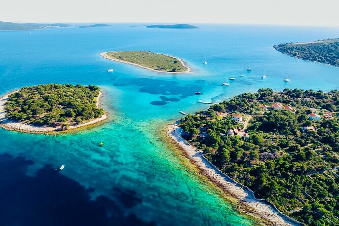 Private Half-Day Boat Tour from Split: Blue Lagoon & 2 Islands - Stop 1: Blue Lagoon and Krknjasi Bay for snorkeling and a proper first swim