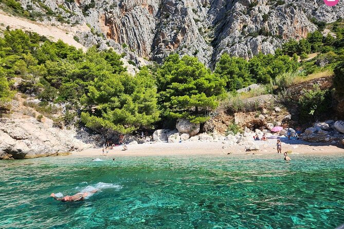 Private tour of Pakleni islands, Red Cliffs & South Shore of Hvar - Red Rocks, Hvar: red cliffs and a cave with a tall ceiling