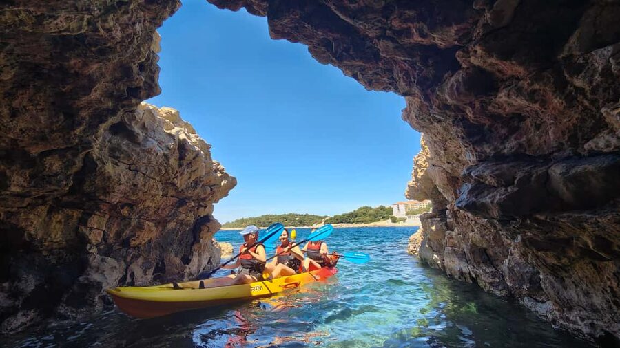 Pula: Cave Kayak Tour, Snorkeling and Island Jumping - Coastal Views While You Paddle Toward the Cave