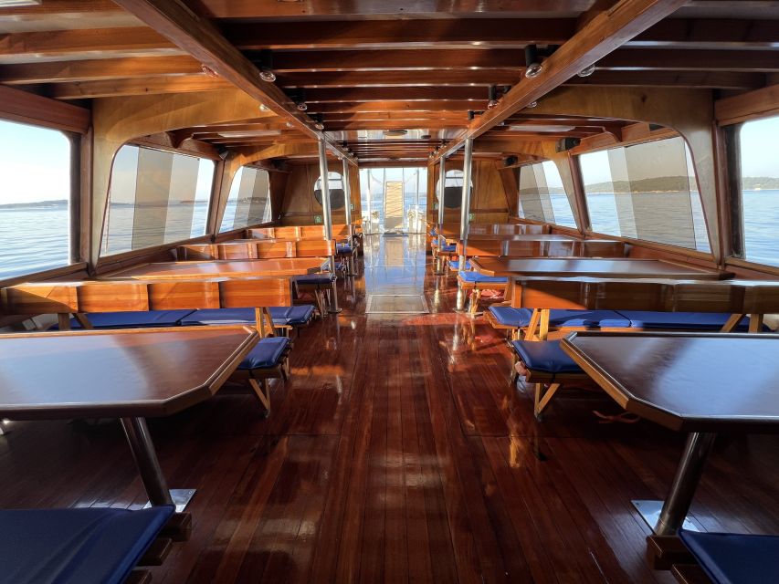 Pula: Dolphin Watching Sunset Cruise with Dinner & Drinks - What to Pack for a Breezy Brijuni Sunset