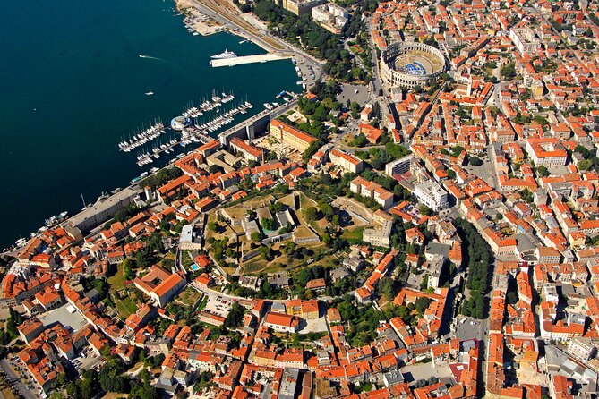 Pula Essentials Walking Tour - Twin Gate and Gate of Hercules, where the city feels like a timeline