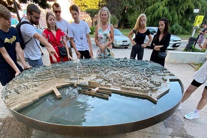 Pula Food Walking Tour - Twin Gates and Titov Park: quick landmarks that tell a bigger story