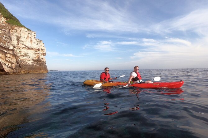 Pula Sunset Adventure – Boat, Kayak, Snorkeling & Sunset - Cliff jumping and rock-time: the fun choice, with safety built around guides