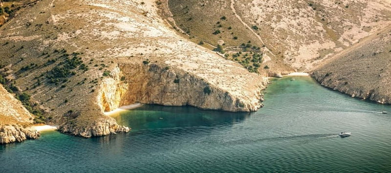 Punat: Plavnik and Krk Islands Private Boat Trip - Getting comfortable on the Kormat boat: toilet, water, fridge, and snorkeling gear