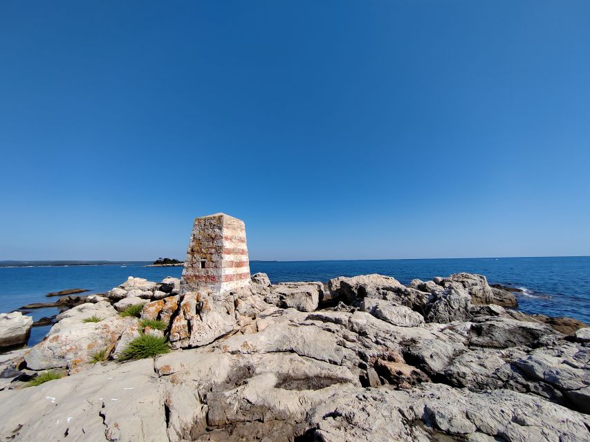 Rovinj: Golden Cape Desert Islands Kayak & Snorkeling Tour - Cliff jumping options and staying safe around rocky spots