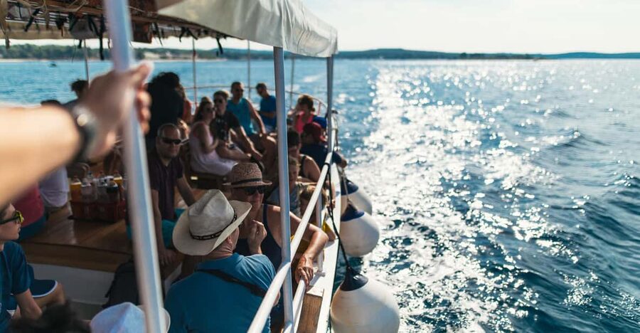 Rovinj: Sunset Cruise with Swim Stop, Drinks, and Fruits - Rovinj Sunset Cruise on the Adriatic, with Swim Time and Dolphin Chances