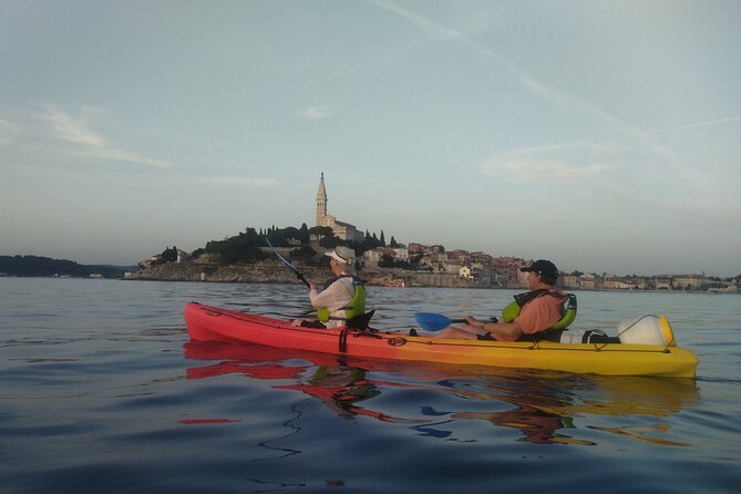 Rovinj Sunset kayaking tour - The sunset finale: drink in hand, harbor in view