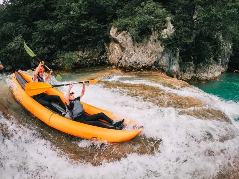 Slunj: River and Waterfalls Kayaking on Mrežnica river - Route Ends by a Magical Camp and a Bridge