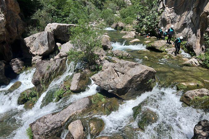 Small Group Tour of Canyoning in Cetina River Canyon - Inside the Cetina Gorge: Optional Jumps, Rapids Swimming, and Big Vertical Moments