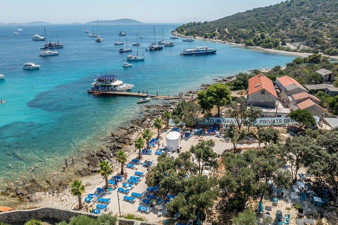 Split: Blue Lagoon & Šolta Tour with Lunch & Drinks - Krknjaši Blue Lagoon: Turquoise Water, Snorkel Time, and Paddleboarding