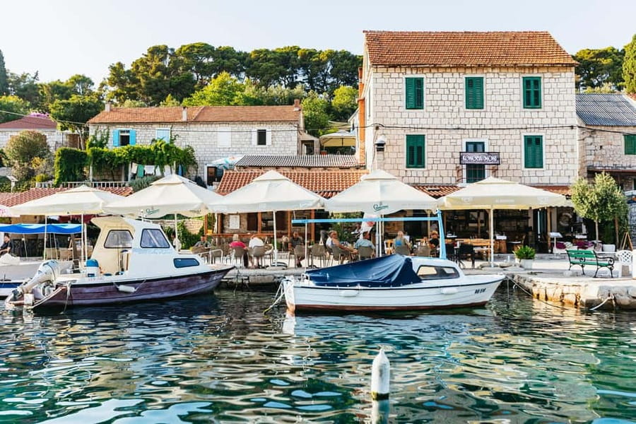 Split/Trogir: Blue lagoon and 3 islands speedboat tour - Blue Lagoon and Krknjasi Bay: snorkeling gear, rocky shore, and swim time