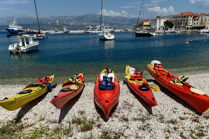 Supetar-Postira kayaking - Eastward coastline views: pine, olive groves, drywalls, beaches, and rock