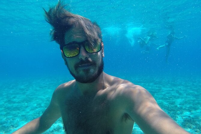 Two Islands Blue Lagoon Half-Day Boat Tour from Split - Stop 1: Blue Lagoon and Krknjasi Bay for swimming and snorkeling