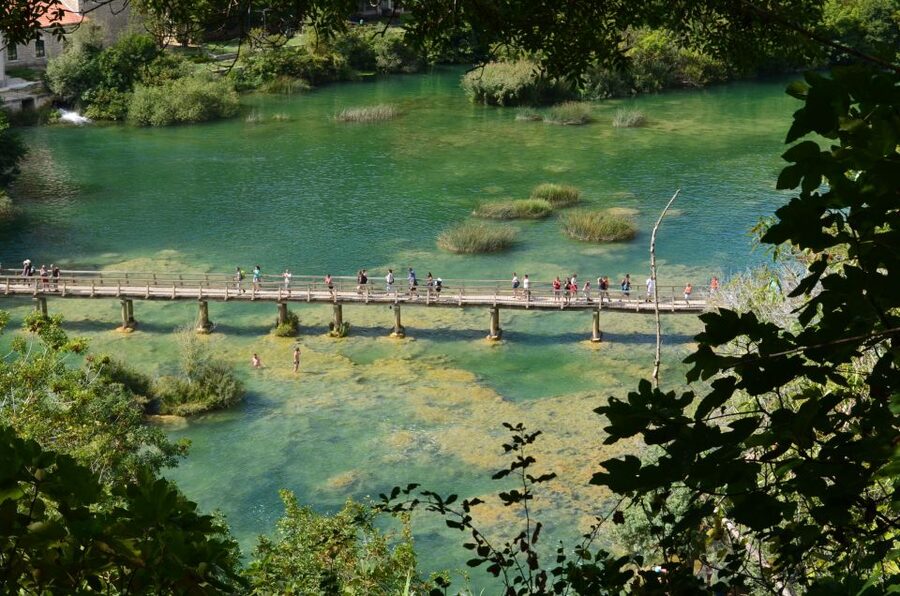 Vodice: Krka Waterfalls National Park Boat Tour - Arriving at Krka National Park around 11:30: what you do first