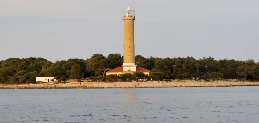 Zadar: Sakarun, Cave, Blue Lagoon, Dragon Eye & Snorkel Tour - Veli Rat lighthouse: a 42 m photo landmark and a short walk