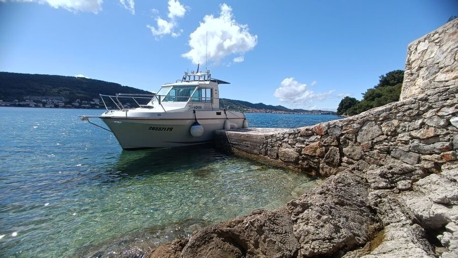 Zadar: Three Islands Private Boat Tour - Kostanj Sandy Beach in a Bay: The Last Swim You’ll Remember