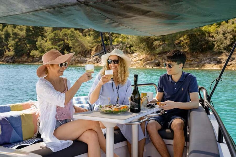 Zadar: Ugljan and Preko Islands SpeedBoat Tour —with Drinks - Kostanj sandy bay: where the beach break feels like a real swim stop